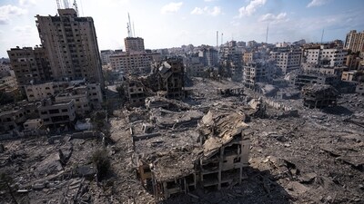 Israel-Hamas war: A view of the rubble of buildings hit by an Israeli airstrike in Gaza City on October 10, 2023. (AP) Israel-Hamas war: A view of the rubble of buildings hit by an Israeli airstrike in Gaza City on October 10, 2023. (AP)