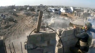 Israel-Hamas War: A member of the Israeli army operates in a location given as Beit Hanoun, northern Gaza strip. (Reuters)