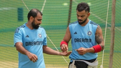 Indian cricket team players Mohammed Shami and Virat Kohli during a training session. (PTI) Indian cricket team players Mohammed Shami and Virat Kohli during a training session. (PTI)