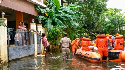 NDRF personnel distribute food and other items amid floods after heavy rainfall in the aftermath of Cyclone Michaung, in Chennai, Thursday, Dec. 7, 2023. (PTI Photo/ R Senthilkumar) NDRF personnel distribute food and other items amid floods after heavy rainfall in the aftermath of Cyclone Michaung, in Chennai, Thursday, Dec. 7, 2023. (PTI Photo/ R Senthilkumar)