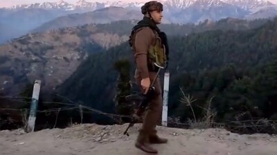 Army personnel stand guard near the site where an Army vehicle was ambushed by terrorists, in Poonch district, (PTI) Army personnel stand guard near the site where an Army vehicle was ambushed by terrorists, in Poonch district, (PTI)