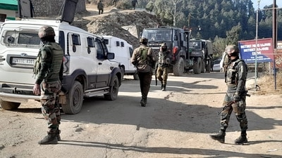 Security personnel during a cordon and search operation near the site where Army vehicles were ambushed by terrorists on Thursday, in Poonch district. (PTI)
