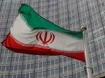 An Iranian flag flutters.