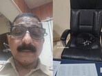Cat sleeping on Senior Inspector's chair. 
