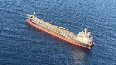 A visual of the MV Chem Pluto taken by the Indian Coast Guard’s Dornier maritime surveillance aircraft in the Arabian Sea after it was hit by a suspected drone which led to fire on it, on Saturday. (ANI) A visual of the MV Chem Pluto taken by the Indian Coast Guard’s Dornier maritime surveillance aircraft in the Arabian Sea after it was hit by a suspected drone which led to fire on it, on Saturday. (ANI)