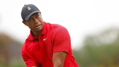 Woods was in the company of his precocious son Charlie -- as his playing partner -- and daughter Sam on the bag (Getty Images via AFP) Woods was in the company of his precocious son Charlie -- as his playing partner -- and daughter Sam on the bag (Getty Images via AFP)