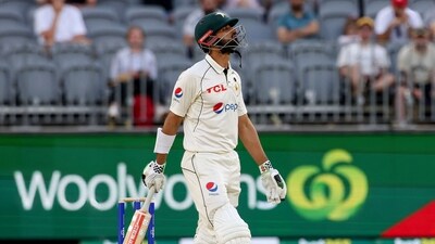 Pakistan's Shan Masood walks off after being caught by Austrlia's Alex Carey during the second day of the first Test cricket match between Australia and Pakistan (AFP) Pakistan's Shan Masood walks off after being caught by Austrlia's Alex Carey during the second day of the first Test cricket match between Australia and Pakistan (AFP)