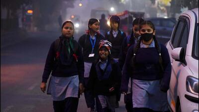 Children going to school on a chilly Friday morning. The Haryana Government on Saturday announced winter vacation for all government and private schools from January 1 to 15 as the cold wave is expected to intensify in the next few days. (HT Photo) Children going to school on a chilly Friday morning. The Haryana Government on Saturday announced winter vacation for all government and private schools from January 1 to 15 as the cold wave is expected to intensify in the next few days. (HT Photo)