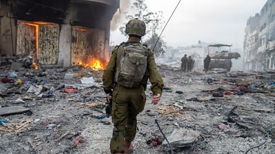 Israel-Hamas War: A soldier operating in the Gaza Strip, amid continuing battles between Israel and Hamas. (AFP) Israel-Hamas War: A soldier operating in the Gaza Strip, amid continuing battles between Israel and Hamas. (AFP)