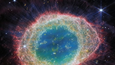 A near-infrared image of the Ring Nebula revealing the complexity of its structure in unprecedented detail is seen in a composite image taken by the James Webb Telescope and released by NASA on August 21, 2023. Physical features within suggest there may be a companion star helping to sculpt the layers thrown off by the dying star.&nbsp; (NASA/ESA via REUTERS)