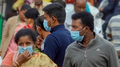 People wearing face masks as a precautionary measure after cases of COVID-19 sub-variant JN.1 were detected in the country. (PTI)