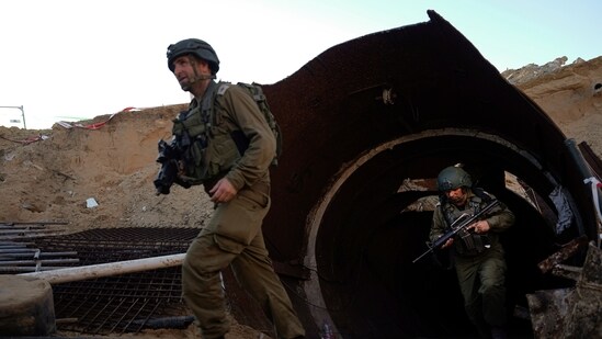 Israel-Hamas War: Israeli soldiers exit a tunnel that the military says Hamas militants used to attack the Erez crossing in the northern Gaza Strip. (AP)