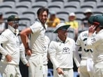 Australia's Mitchell Starc (3rd R) reacts after taking the wicket of Pakistan's Abdullah Shafique (L) on day four of the first Test cricket match between Australia and Pakistan in Perth on December 17, 2023 Australia's Mitchell Starc (3rd R) reacts after taking the wicket of Pakistan's Abdullah Shafique (L) on day four of the first Test cricket match between Australia and Pakistan in Perth on December 17, 2023
