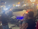 The white car seen in the video appears to lack a visible number plate.