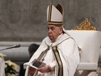Pope Francis presides the Christmas Eve mass at St. Peter's Basilica in the Vatican on December 24. Pope Francis presides the Christmas Eve mass at St. Peter's Basilica in the Vatican on December 24.