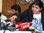 Wrestlers Vinesh Phogat , Bajrang Punia and Sakshi Malik during a press conference at Press Club of India , in New Delhi, India, on Thursday, December 21, 2023. (Hindustan Times)