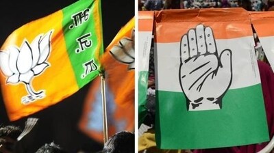 A picture of BJP and Congress party flags. A picture of BJP and Congress party flags.