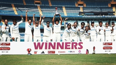 India Women's players celebrate with the trophy after winning the Only Test match by 8 wickets against Australia Women, at Wankhede Stadium in Mumbai (ICC Twitter) India Women's players celebrate with the trophy after winning the Only Test match by 8 wickets against Australia Women, at Wankhede Stadium in Mumbai (ICC Twitter)