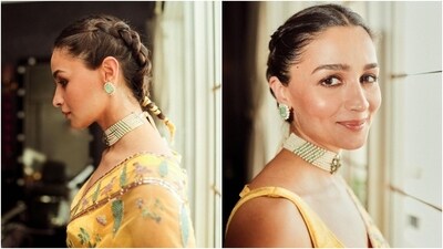 Lastly, Alia chose on-fleek darkened brows, subtle shimmery smoky eyes, mascara on the lashes, glossy nude pink lip shade, a rosy pink dewy base, and a centre-parted braided hairdo adorned with a hair tie matching her saree for the glam picks. (Instagram) Lastly, Alia chose on-fleek darkened brows, subtle shimmery smoky eyes, mascara on the lashes, glossy nude pink lip shade, a rosy pink dewy base, and a centre-parted braided hairdo adorned with a hair tie matching her saree for the glam picks. (Instagram)