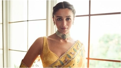 Earlier, Alia had shared pictures of herself dressed in a yellow saree and a backless blouse. The actor wore the ensemble to attend a friend's wedding. She shared the photos with the caption, "Laddoo Pila szn." For the uninitiated, the Laddoo Pila term comes from a viral video. (Instagram) Earlier, Alia had shared pictures of herself dressed in a yellow saree and a backless blouse. The actor wore the ensemble to attend a friend's wedding. She shared the photos with the caption, "Laddoo Pila szn." For the uninitiated, the Laddoo Pila term comes from a viral video. (Instagram)
