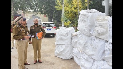 Amritsar commissioner of police Gurpreet Singh Bhullar (L) with other officials inspecting 15 lakh pharma opioids in Amritsar, on Sunday. (Sameer Sehgal/HT) Amritsar commissioner of police Gurpreet Singh Bhullar (L) with other officials inspecting 15 lakh pharma opioids in Amritsar, on Sunday. (Sameer Sehgal/HT)
