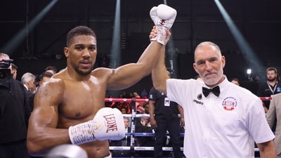 Britain's Anthony Joshua celebrates after defeating Sweden's Otto Wallin (AFP) Britain's Anthony Joshua celebrates after defeating Sweden's Otto Wallin (AFP)
