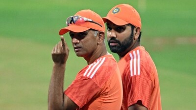 India captain Rohit Sharma (R) speaks with coach Rahul Dravid during a practice session (AFP) India captain Rohit Sharma (R) speaks with coach Rahul Dravid during a practice session (AFP)