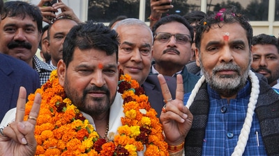 BJP MP Brij Bhushan Sharan Singh with the newly-elected president of the Wrestling Federation of India (WFI) Sanjay Singh at the former's residence (PTI) BJP MP Brij Bhushan Sharan Singh with the newly-elected president of the Wrestling Federation of India (WFI) Sanjay Singh at the former's residence (PTI)