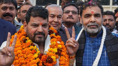 BJP MP Brij Bhushan Sharan Singh with the newly-elected president of the Wrestling Federation of India (WFI) Sanjay Singh. (PTI) BJP MP Brij Bhushan Sharan Singh with the newly-elected president of the Wrestling Federation of India (WFI) Sanjay Singh. (PTI)