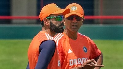 Virat Kohli with coach Rahul Dravid during a practice session ahead of the first Test cricket match between India and South Africa (PTI) Virat Kohli with coach Rahul Dravid during a practice session ahead of the first Test cricket match between India and South Africa (PTI)