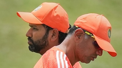 Centurion: India's Rohit Sharma with coach Rahul Dravid during a practice session ahead of the first Test cricket match between India and South Africa (PTI) Centurion: India's Rohit Sharma with coach Rahul Dravid during a practice session ahead of the first Test cricket match between India and South Africa (PTI)