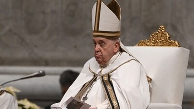 Pope Francis presides the Christmas Eve mass at St. Peter's Basilica in the Vatican on December 24. (AFP) Pope Francis presides the Christmas Eve mass at St. Peter's Basilica in the Vatican on December 24. (AFP)