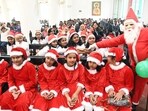 Children dressed as Santa Claus participating in Christmas celebrations at Danapur St. Luke's Church in Patna, Bihar, on Monday.(HT Photo/ Santosh Kumar)