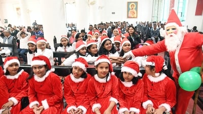 Children dressed as Santa Claus participating in Christmas celebrations at Danapur St. Luke's Church in Patna, Bihar, on Monday. (HT Photo/ Santosh Kumar)