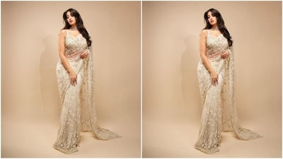 Nora's ethereal saree comes in an enchanting ivory shade and is made from luxurious net fabric adorned with intricate three-dimensional floral embroidery all over. She pairs it with a matching blouse with a plunging neckline and sequined embellishments and pearl tassels. (Instagram/@norafatehi) Nora's ethereal saree comes in an enchanting ivory shade and is made from luxurious net fabric adorned with intricate three-dimensional floral embroidery all over. She pairs it with a matching blouse with a plunging neckline and sequined embellishments and pearl tassels. (Instagram/@norafatehi)
