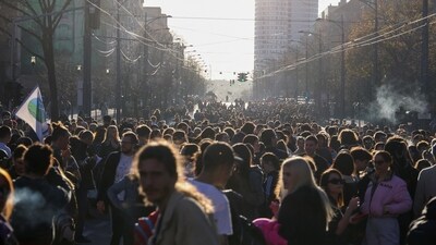 Students block the road, during a protest against alleged major election law violations in the Belgrade city and parliament races, in Belgrade, Serbia. (Reuters)
