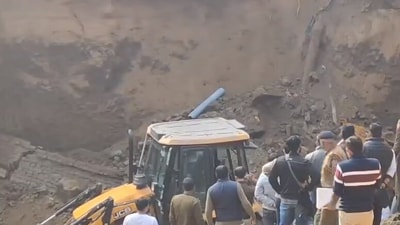 Rescue efforts are underway to save trapped workers after an under-construction temple wall collapsed on Monday in Gurugram. (ANI) Rescue efforts are underway to save trapped workers after an under-construction temple wall collapsed on Monday in Gurugram. (ANI)
