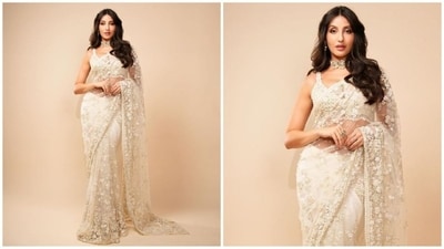 On Sunday, Nora gave her fans a weekend surprise as the actress took to Instagram and uploaded a series of stunning pictures in a mesmerising white saree accompanied by a few quirky emoticons as captions. (Instagram/@norafatehi) On Sunday, Nora gave her fans a weekend surprise as the actress took to Instagram and uploaded a series of stunning pictures in a mesmerising white saree accompanied by a few quirky emoticons as captions. (Instagram/@norafatehi)
