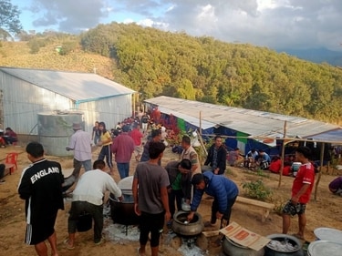 Mizoram residents celebrate Christmas with Myanmar refugees with a feast at the camp in Champai. (Courtesy Young Mizo Association)