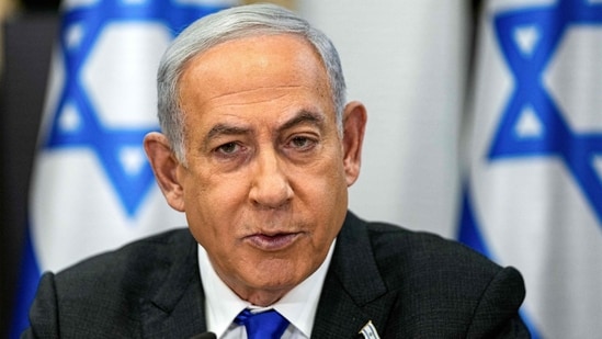 Israel's prime minister Benjamin Netanyahu chairs a cabinet meeting at the Kirya military base. (AFP)