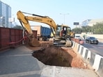 The repairing work of caved in road at Gurugram-Sohna elevated expressway going on at sector-47 near SD Adarsh Vidyalaya, in Gurugram