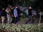 Israeli embassy officials and members of the security forces check the area, following a reported explosion. 