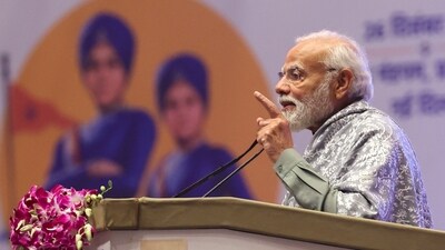 Prime Minister Narendra Modi addresses a gathering at the 'Veer Baal Diwas' celebration programme, at the Bharat Mandapam, in New Delhi. (HT Photo)