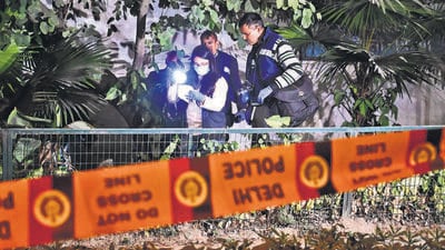 A forensic team inspects the area after a low-intensity blast at the Israel Embassy in New Delhi on Tuesday. (Vipin Kumar/HT photo)