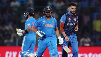India's Rohit Sharma and Afghanistan's Naveen Ul Haq (R) (ANI) India's Rohit Sharma and Afghanistan's Naveen Ul Haq (R) (ANI)
