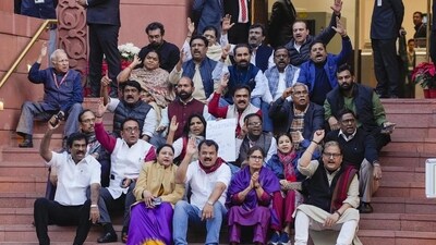 New Delhi: Suspended Opposition MPs protest during the Winter session of Parliament on Monday. (PTI)