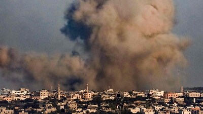 Israel-Hamas War: A smoke plume erupts over Khan Yunis from Rafah in the southern Gaza strip during Israeli bombardment. (AFP) Israel-Hamas War: A smoke plume erupts over Khan Yunis from Rafah in the southern Gaza strip during Israeli bombardment. (AFP)