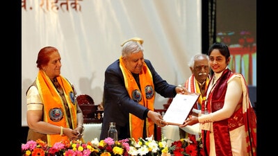 Vice-president Jagdeep Dhankhar awarding a degree to a scholar at MDU convocation ceremony at Rohtak . (HT) Vice-president Jagdeep Dhankhar awarding a degree to a scholar at MDU convocation ceremony at Rohtak . (HT)