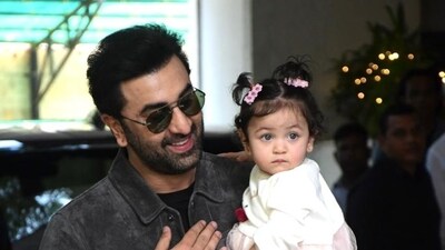 Raha, who turned one on November 6, was dressed in a white and pink frock with a reindeer on the front and a pair of red shoes. Ranbir carried the little one in his arms with Alia by their side. Raha, who turned one on November 6, was dressed in a white and pink frock with a reindeer on the front and a pair of red shoes. Ranbir carried the little one in his arms with Alia by their side.