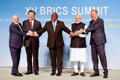 (FILES) (From L to R) President of Brazil Luiz Inacio Lula da Silva, President of China Xi Jinping, South African President Cyril Ramaphosa, Prime Minister of India Narendra Modi and Russia's Foreign Minister Sergei Lavrov pose for a BRICS family photo during the 2023 BRICS Summit at the Sandton Convention Centre in Johannesburg on August 23, 2023. (AFP) (FILES) (From L to R) President of Brazil Luiz Inacio Lula da Silva, President of China Xi Jinping, South African President Cyril Ramaphosa, Prime Minister of India Narendra Modi and Russia's Foreign Minister Sergei Lavrov pose for a BRICS family photo during the 2023 BRICS Summit at the Sandton Convention Centre in Johannesburg on August 23, 2023. (AFP)